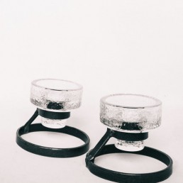Candlestick made of metal and glass